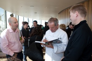 2011 Super Bowl - Wolfgang Puck Signing His Book for VIP Guests 